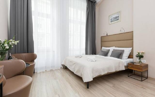 Slaapkamer van appartementen Pergamin Royal in Krakau